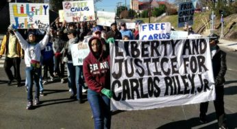 Defend Carlos Riley Jr. against police brutality