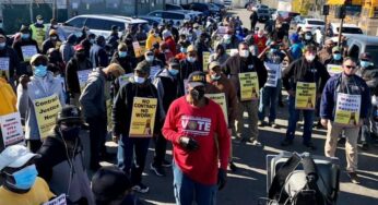 Boston bus drivers take contract struggle to the street