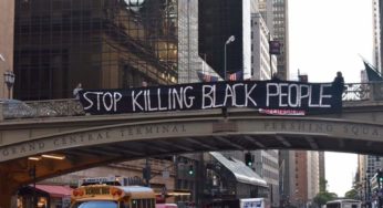With banner drops NYC activists demand justice for Eric Garner