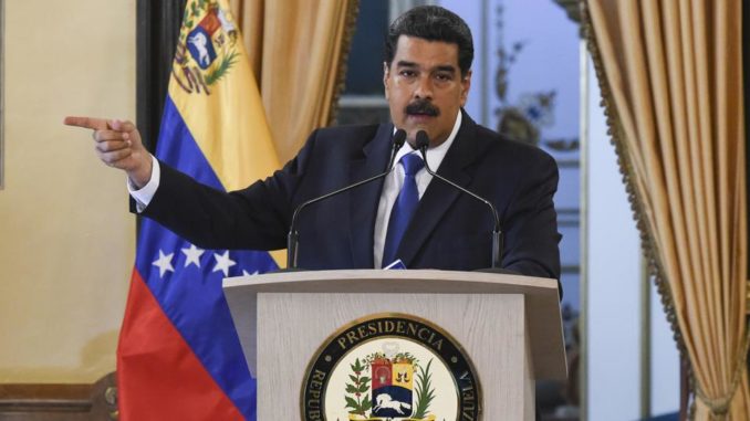 Venezuelan government and a section of the opposition sign a five-point pact and establish the National Dialogue Table